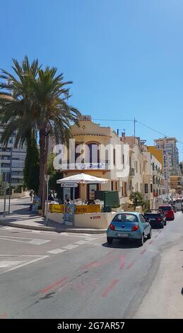 Calpe, Alicante, Spain.- August 24 2016; Street corner with restaurant name el ancla translates to The Anchor and sign directing to port Stock Photo