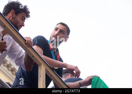 Rome, Italy. 12th July, 2021. Gianluigi Donnarumma, player of Italian National Football Team celebrate victory of European Football Championship by showing the cup on an open bus through the streets of Rome with fans following them and singing choirs (Photo by Matteo Nardone/Pacific Press) Credit: Pacific Press Media Production Corp./Alamy Live News Stock Photo