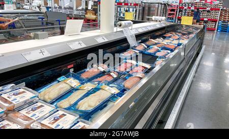 Orlando,FL USA - May 31, 2021: A display of various fish in the seafood department of a Sams Club Wholesale Store in Orlando, Florida. Stock Photo