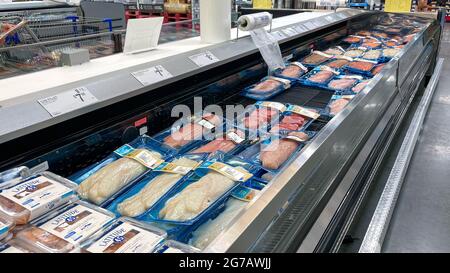 Orlando,FL USA - May 31, 2021: A display of various fish in the seafood department of a Sams Club Wholesale Store in Orlando, Florida. Stock Photo