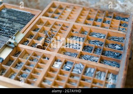 Letters in a metal type case Stock Photo