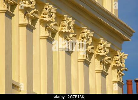 Detail of Corinthian column capitals of Brunswick Terrace, part of a complex of elegant Regency houses in Hove on Brighton and Hove seafront. East Sussex England UK Stock Photo