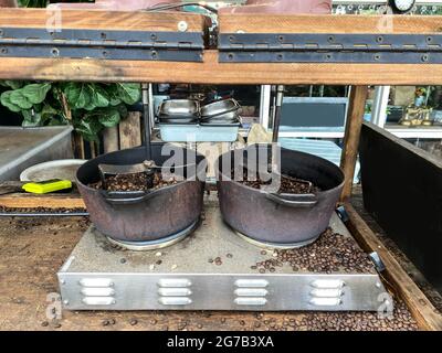 Coffee beans roasting in a machine Stock Photo