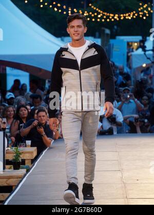 A  male model walks on the runway at the Alton Gray fashion show in Montreal. Quebec,Canads Stock Photo