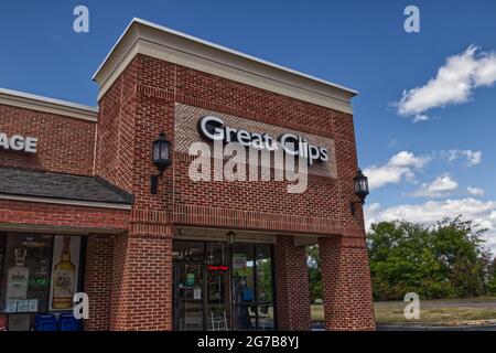 Augusta, Ga USA - 04 25 21: Great Clips haircut retail store exterior sign and entrance Stock Photo