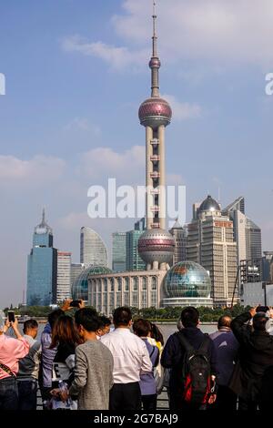 View from The Bund across the Huangpu River to the skyline of the Pudong Special Economic Zone with Oriental Pearl Tower, Shanghai, People's Republic Stock Photo