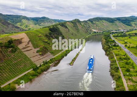 River cruise ship on the Moselle river bend at Bremm, Moselle valley, Germany Stock Photo