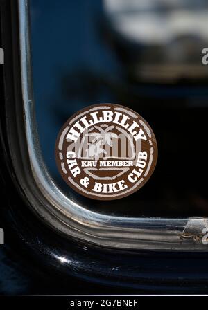 A Hillbilly Car and Bike Club decal on the window of a vintage car on display at a classic car show in Santa Fe, New Mexico. Stock Photo