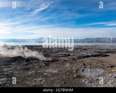Sulphur Point is a strange and unique tourist attraction on the coastline in Rotorua, that looks like a desolate wasteland, with geothermal activity Stock Photo