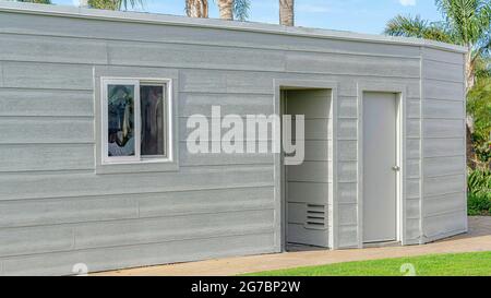 Pano Building with flat roof and gray exterior wall in Huntington Beach ...