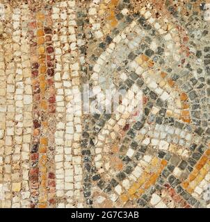 The texture of the mosaic of the lined floors in the baths Herod's palace in the Caesarea Primorskaya national park Stock Photo