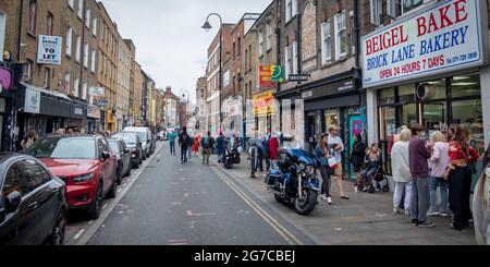 London- July, 2021:  Beigel Bake, a famous bagel shop on Brick Lane, a fashionable area of East London Stock Photo