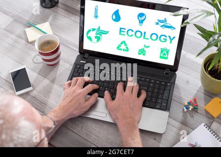 Ecology concept shown on a laptop used by a man Stock Photo
