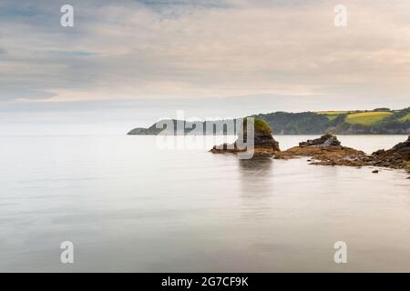 View of beach at port town of Charlestown in Cornwall Stock Photo