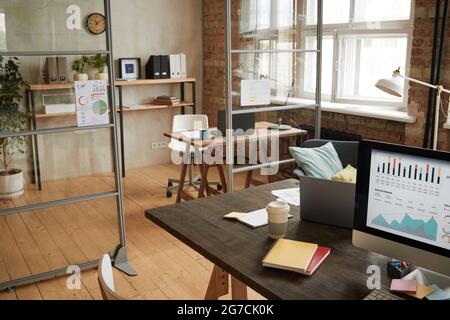 Image of empty modern office with workplace with computer on it Stock Photo