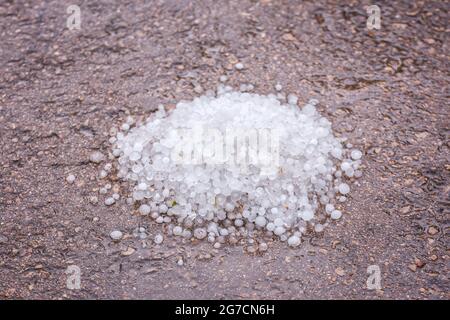 A pile of large hail on the ground Stock Photo