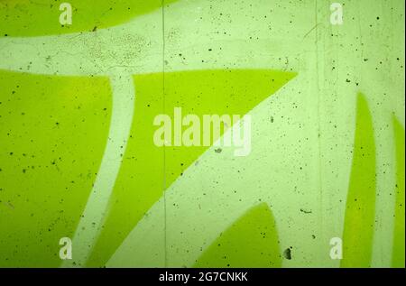 Concrete wall painted two green shades: apple green and pastel Stock Photo