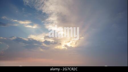 Hope concept with sun rays on a dramatic sky Stock Photo