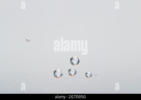 co2 bubbles in mineral water Stock Photo