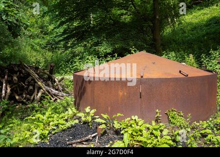 A traditional charcoal kiln in Millington Wood, Lily Dale, Yorkshire Wolds, UK Stock Photo