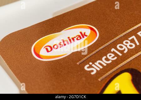 Tyumen, Russia-May 25, 2021: Doshirak logo. Selective focus. Doshirak is a brand of instant noodles produced by Paldo in South Korea. Stock Photo