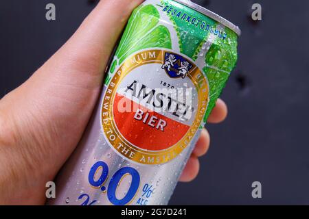 Tyumen, Russia-May 25, 2021: Amstel beer can non-alcoholic with lime and mint. Dark background Stock Photo