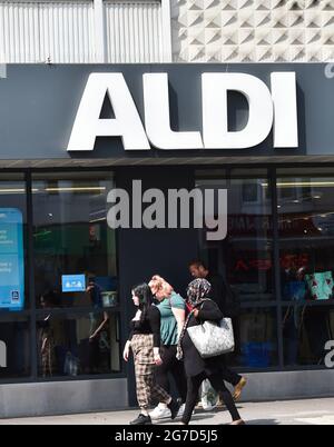 Brighton UK 13th July 2021 - Shoppers out in Brighton today as Brighton and Hove has been declared a city 'enhanced response area' following an alarming rise in Covid-19 cases particularly of the Delta variant .The city council is to receive extra government help and support which would boost testing and ensure the city can remain safe and open for business as the next easing of restrictions will begin next Monday .: Credit Simon Dack / Alamy Live News Stock Photo