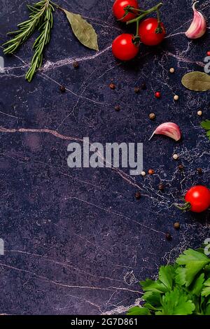 Food background - fresh vegetables and various spices. Cooking concept. Top view. Stock Photo