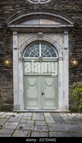 Old wooden door of city church in Monschau, Germany. Stock Photo