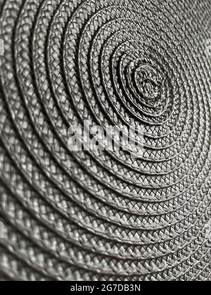 Background from circular wicker pattern texture. Grey weave texture. Stock Photo