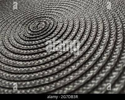Close up of a grey plastic wicker basket texture as a background, Mesh texture. Selective focus. Stock Photo