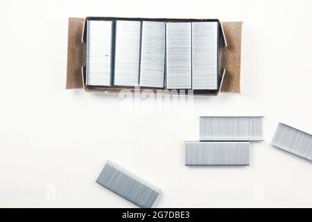 Stapler pin on isolated surface, new image Stock Photo