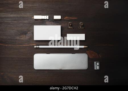 Blank branding identity set on wooden background. Stationery template. Top view. Flat lay. Stock Photo