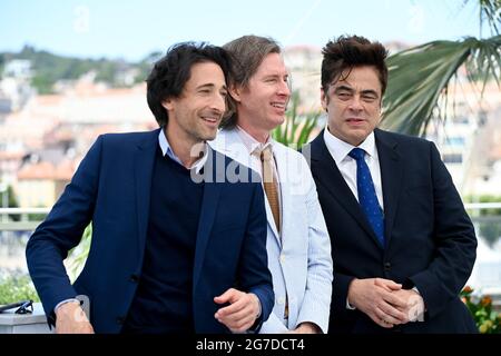 Adrien Brody, Wes Anderson, Benicio Del Toro attending the photocall of the movie The French Dispatch during the 74th Cannes Film Festival in Cannes, France on July 13 2021. Photo by Julien Reynaud/APS-Medias/ABACAPRESS.COM Stock Photo