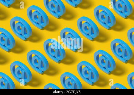 Isometric seamless pattern of blue at symbol on yellow background. 3d illustration. Stock Photo