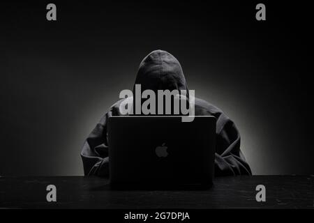 Computer hacker testing cyber security Stock Photo
