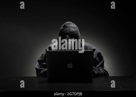 Computer hacker testing cyber security Stock Photo