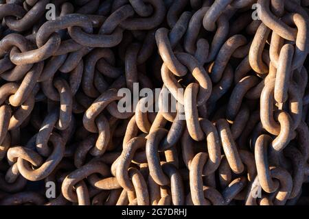 Heavy thick rusty metal chain links. Stock Photo