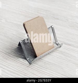 Photo of blank kraft business cards and card holder. Placing your design. Stock Photo