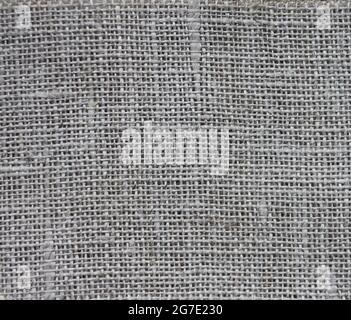 Natural rough gray linen texture. Fabric background. Stock Photo