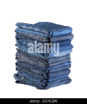 Stack of blue jeans isolated on white background with clipping path Stock Photo