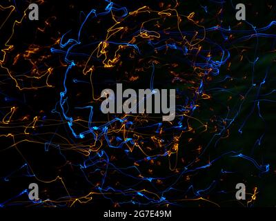 An abstract background of light trails and swirls Stock Photo
