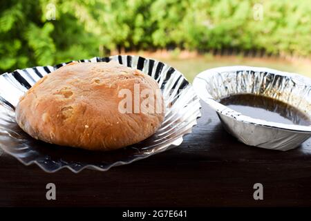 Delicious popular Indian teatime snack or breakfast dish item Dal Kachori deep fried. top view Kachodi snacks serve with khajur chutney Stock Photo