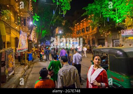 KOLKATA , INDIA - OCTOBER 18, 2015 : Night image of decorated street of Kolkata, shot at colored light, during Durga Puja festival, West Bengal, India Stock Photo