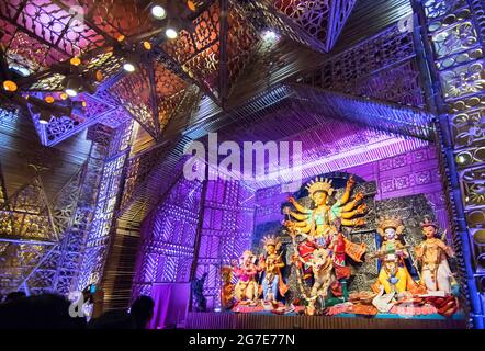 KOLKATA , INDIA - OCTOBER 18, 2015 : Night image of decorated Durga Puja pandal, shot at colored light, at Kolkata, West Bengal, India. Durga Puja is Stock Photo