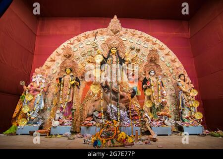 KOLKATA , INDIA - OCTOBER 18, 2015 : Night image of decorated Durga Puja pandal, shot at colored light, at Kolkata, West Bengal, India. Durga Puja is Stock Photo