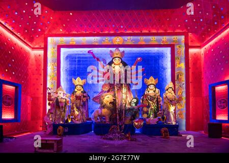 KOLKATA , INDIA - OCTOBER 18, 2015 : Night image of decorated Durga Puja pandal, shot at colored light, at Kolkata, West Bengal, India. Durga Puja is Stock Photo