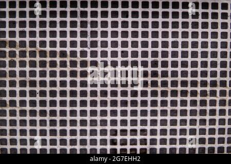 Closeup shot of brown and white cube pattern with slight shadow and lighting on top Stock Photo