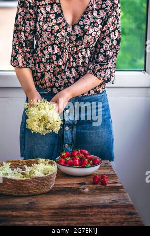 Strawberries on a rustic wooden table Stock Photo