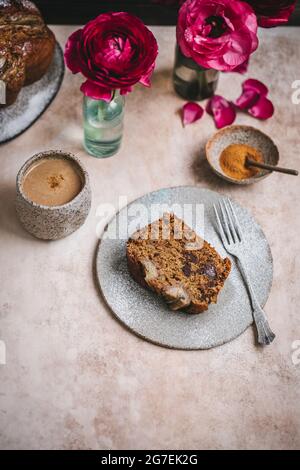 Slice of banana bread served on a ceramic plate Stock Photo